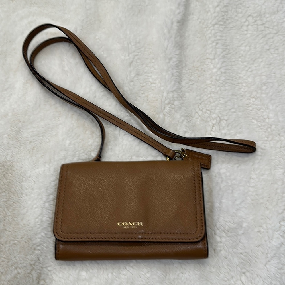 Brown Coach crossbody wallet